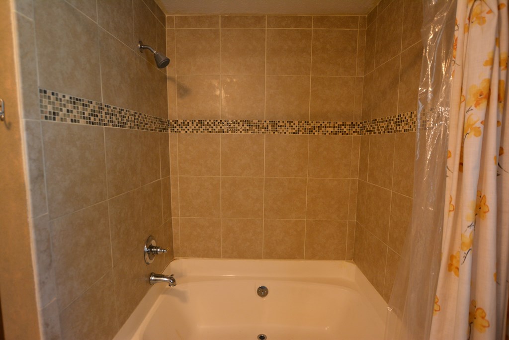 9 Lott Road Phenix City, AL 36869 - Photo 10 of 23 a bathroom with a shower