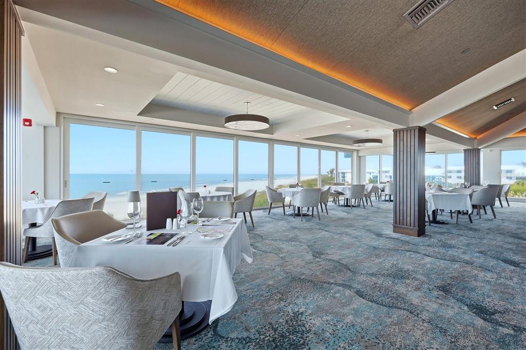 5000 Gasparilla Road, Unit BC205 Boca Grande, FL 33921 - Photo 26 of 50 a view of a dining room with furniture