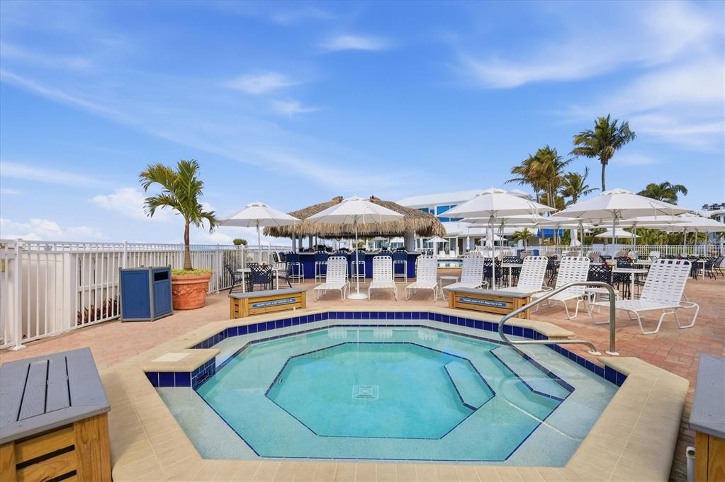 5000 Gasparilla Road, Unit BC205 Boca Grande, FL 33921 - Photo 33 of 50 an outdoor space with swimming pool and furniture