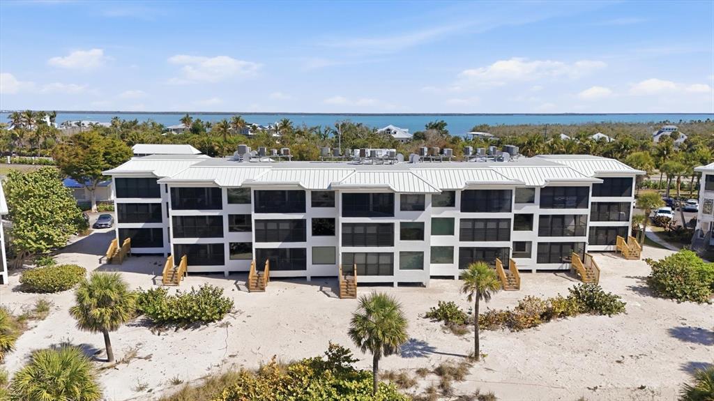 5000 Gasparilla Road, Unit BC205 Boca Grande, FL 33921 - Photo 47 of 50 aerial view of a house with a large window and balcony