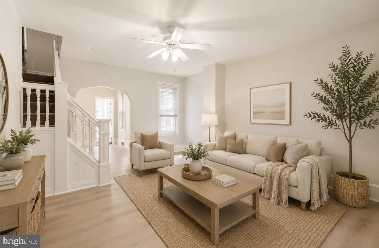 4817 Ridge Avenue Philadelphia, PA 19129 - Photo 4 of 34 a living room with furniture and a chandelier
