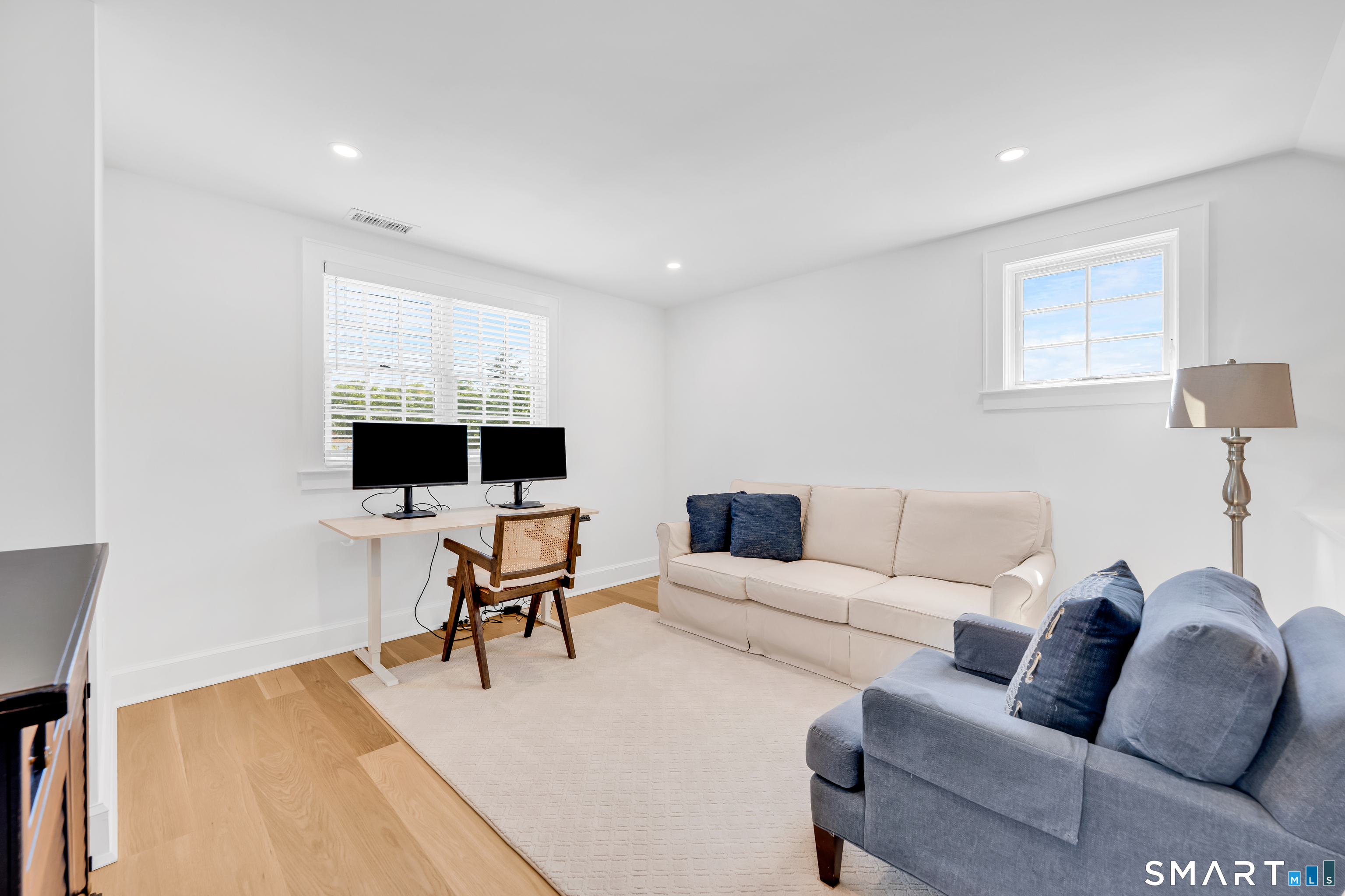 920 Old Post Road Fairfield, CT 06824 - Photo 25 of 40 This sitting room adjoins the 4th bedroom on the 3rd level. Perfect for weekend guests, post-college children or an au pair set-up. Such versatile space...