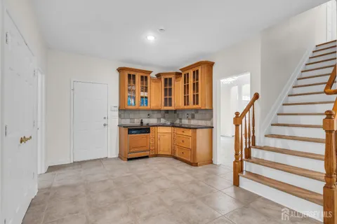 a large bathroom with a large tub and sink
