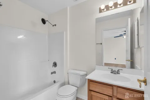 a view of a swimming pool with a yard