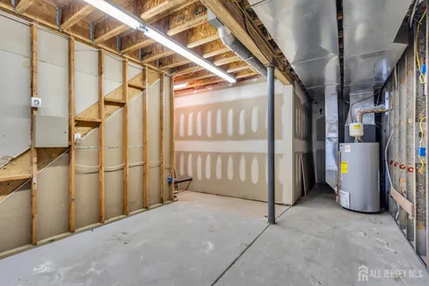 an aerial view of a house with garden space and street view