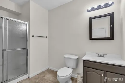 an aerial view of a residential houses with city view