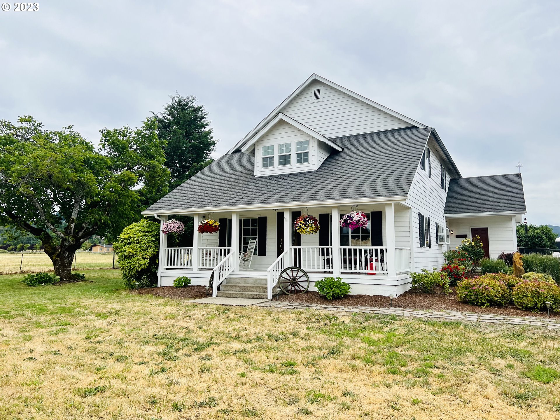 5393 Nonpareil Road Sutherlin, OR 97479 - Photo 1 of 42 a front view of a house with a yard
