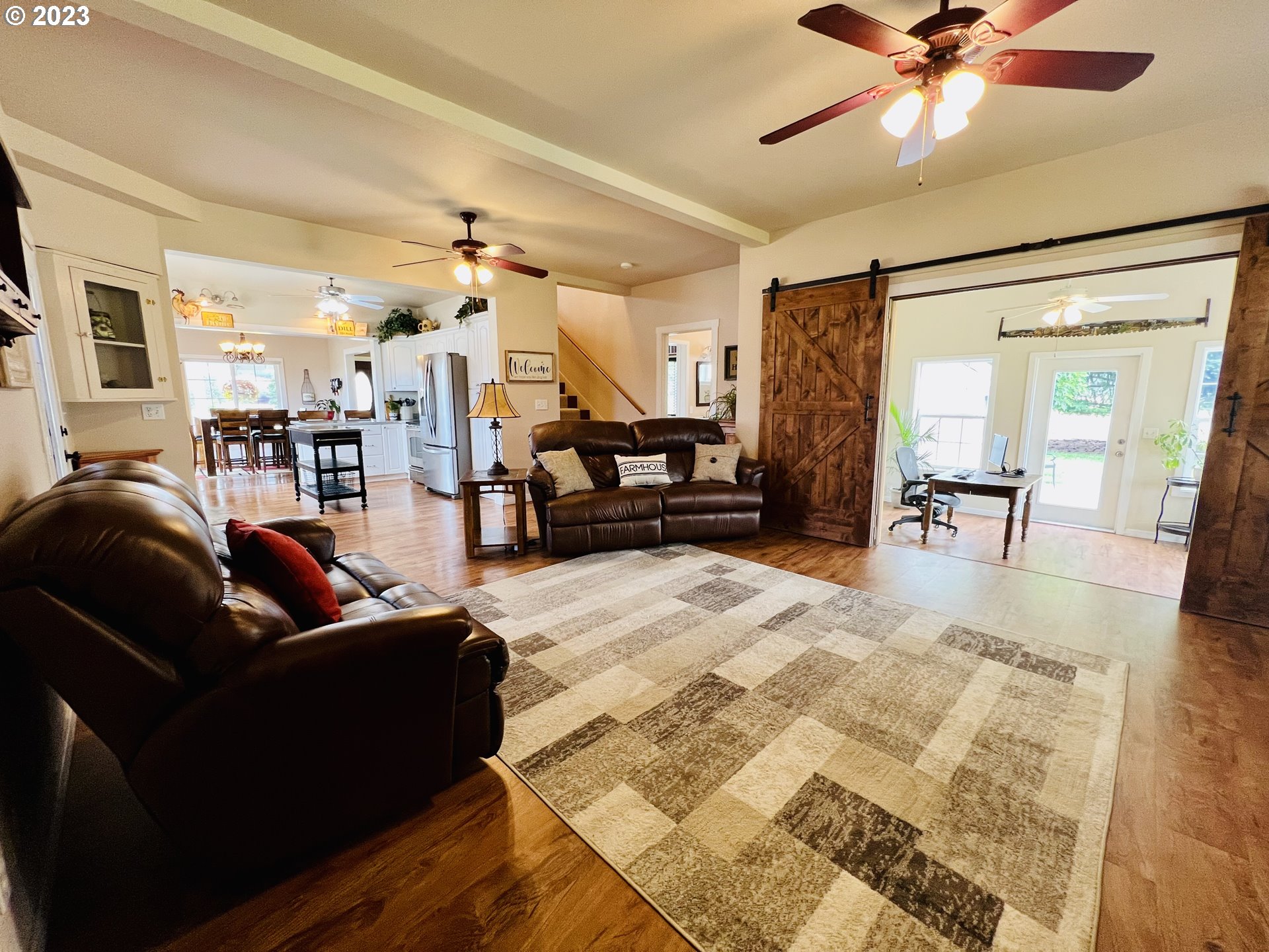 5393 Nonpareil Road Sutherlin, OR 97479 - Photo 14 of 42 a living room with furniture and a wooden floor