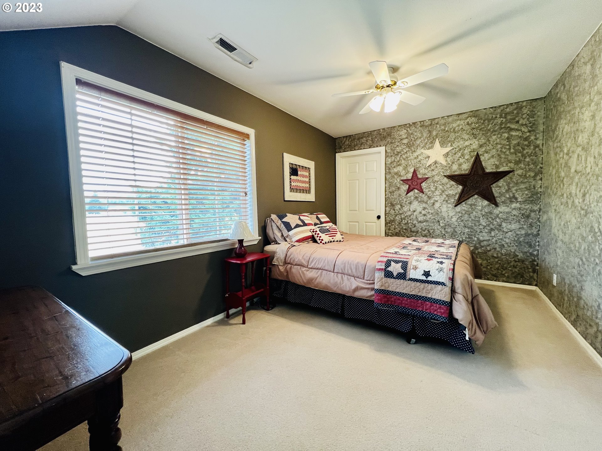 5393 Nonpareil Road Sutherlin, OR 97479 - Photo 25 of 42 a bedroom with a bed and a window
