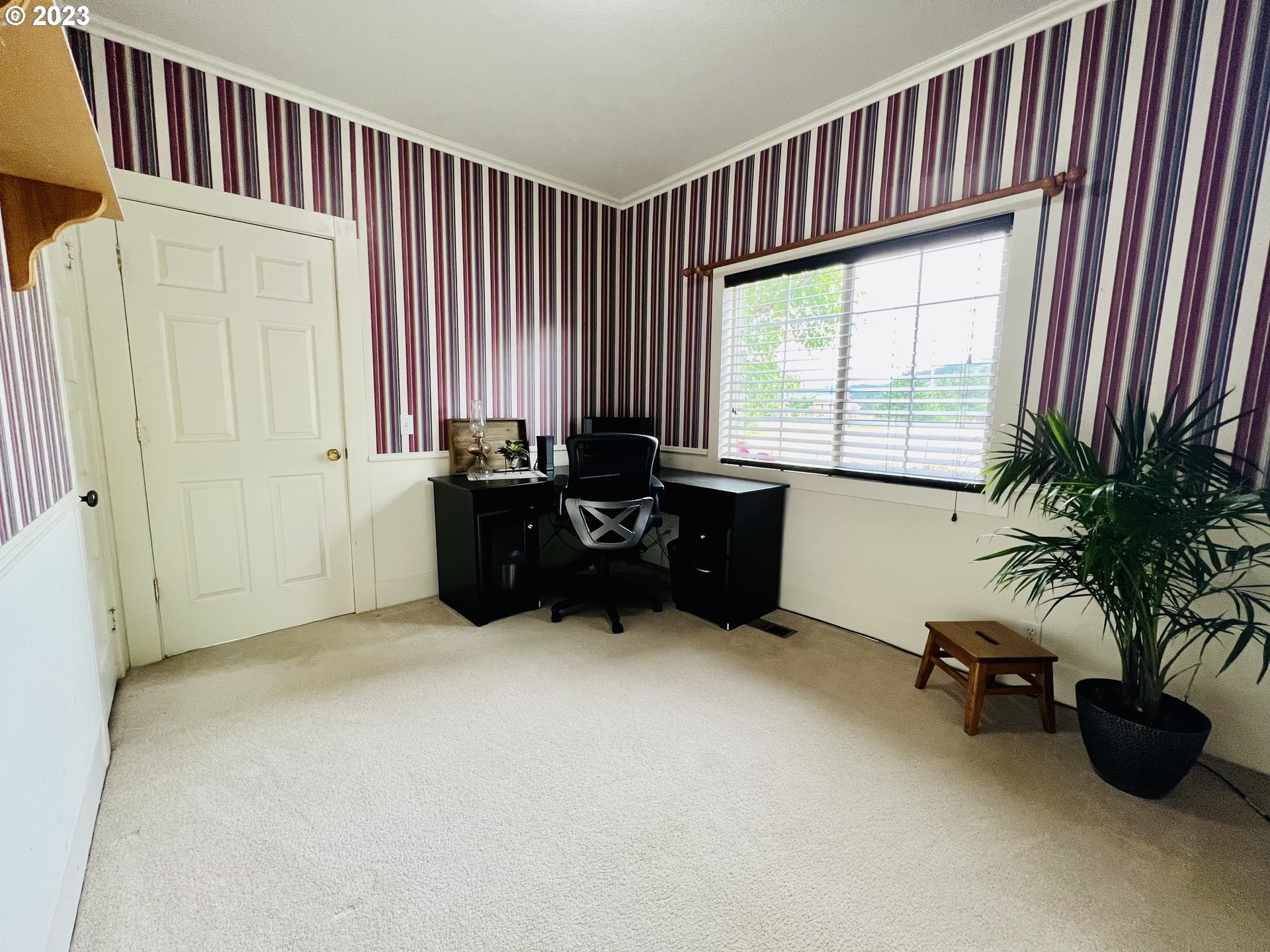 5393 Nonpareil Road Sutherlin, OR 97479 - Photo 27 of 42 a bed room with furniture and a window