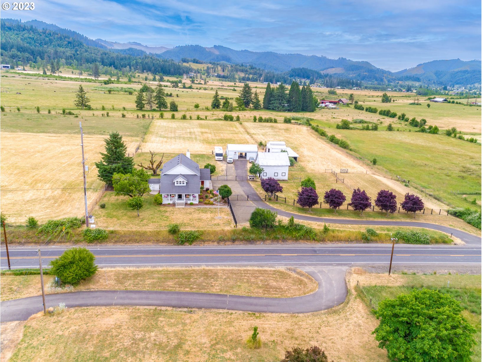 5393 Nonpareil Road Sutherlin, OR 97479 - Photo 3 of 42 a view of a swimming pool with an ocean view