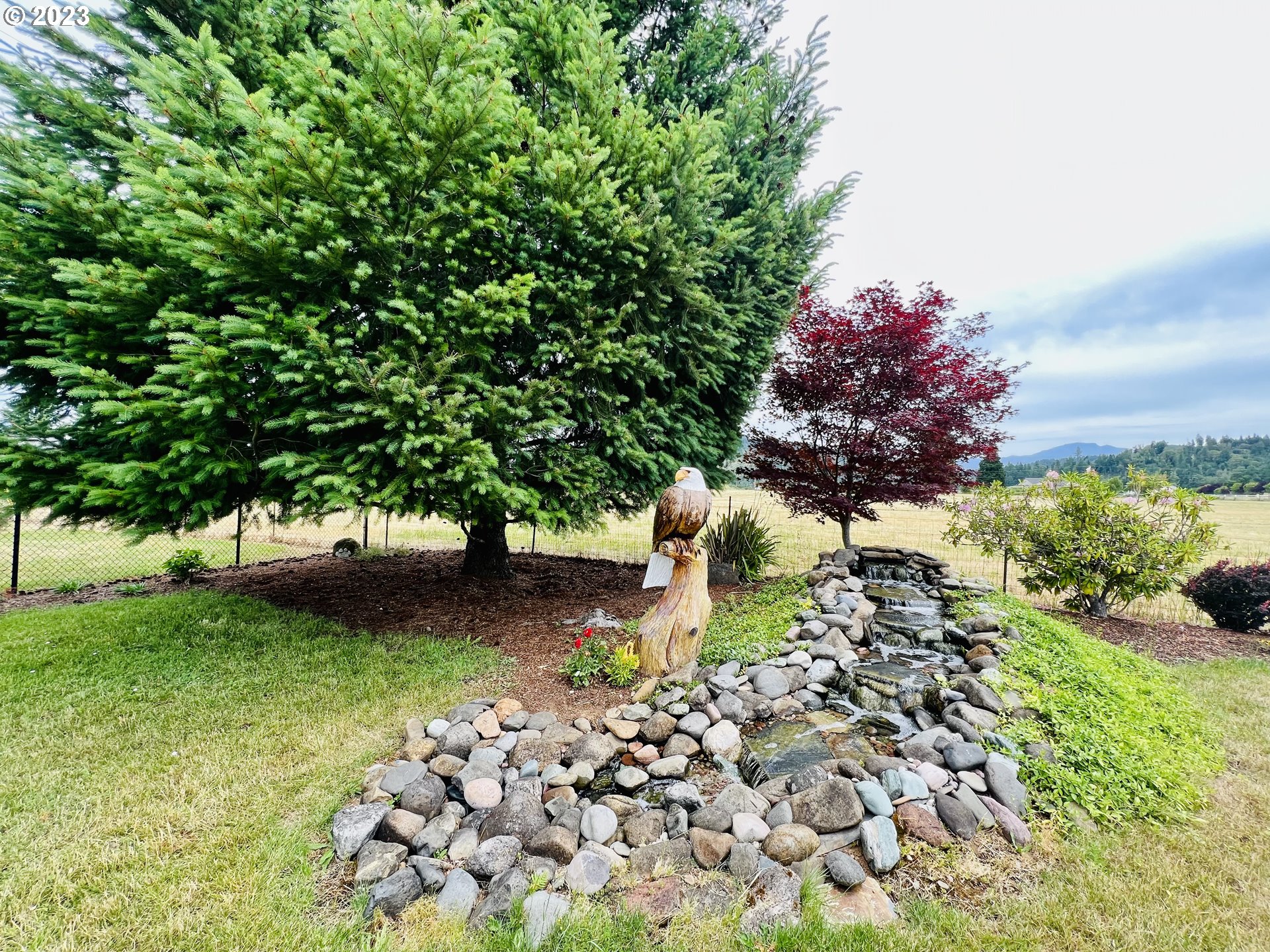 5393 Nonpareil Road Sutherlin, OR 97479 - Photo 31 of 42 a fire hydrant in the middle of the garden