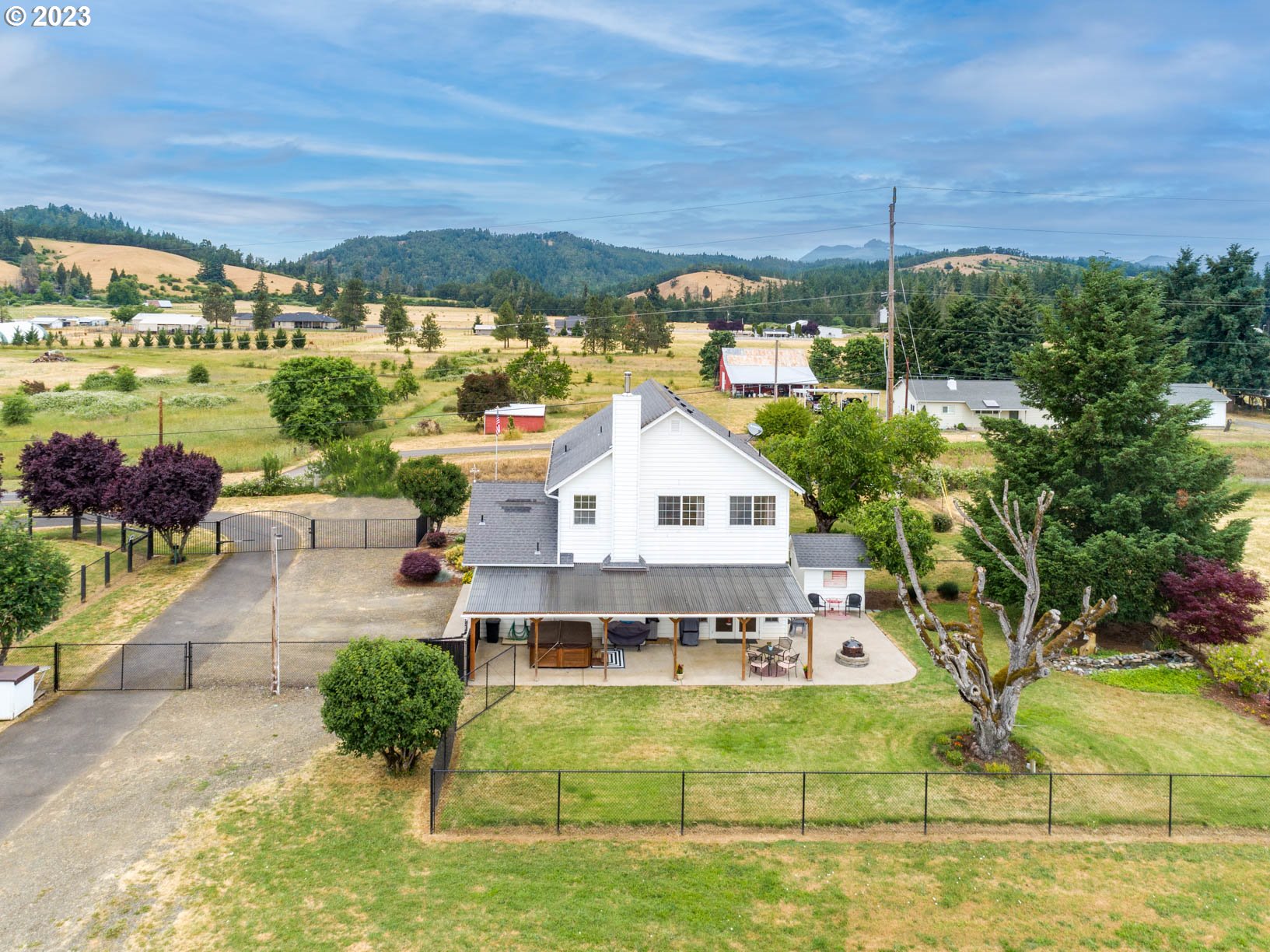 5393 Nonpareil Road Sutherlin, OR 97479 - Photo 33 of 42 a view of a swimming pool with a patio
