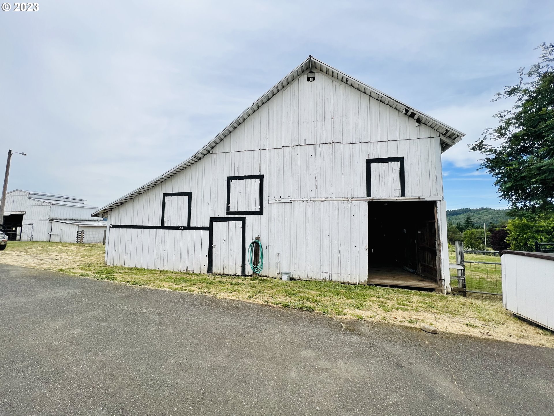 5393 Nonpareil Road Sutherlin, OR 97479 - Photo 34 of 42 a view of a house with a yard