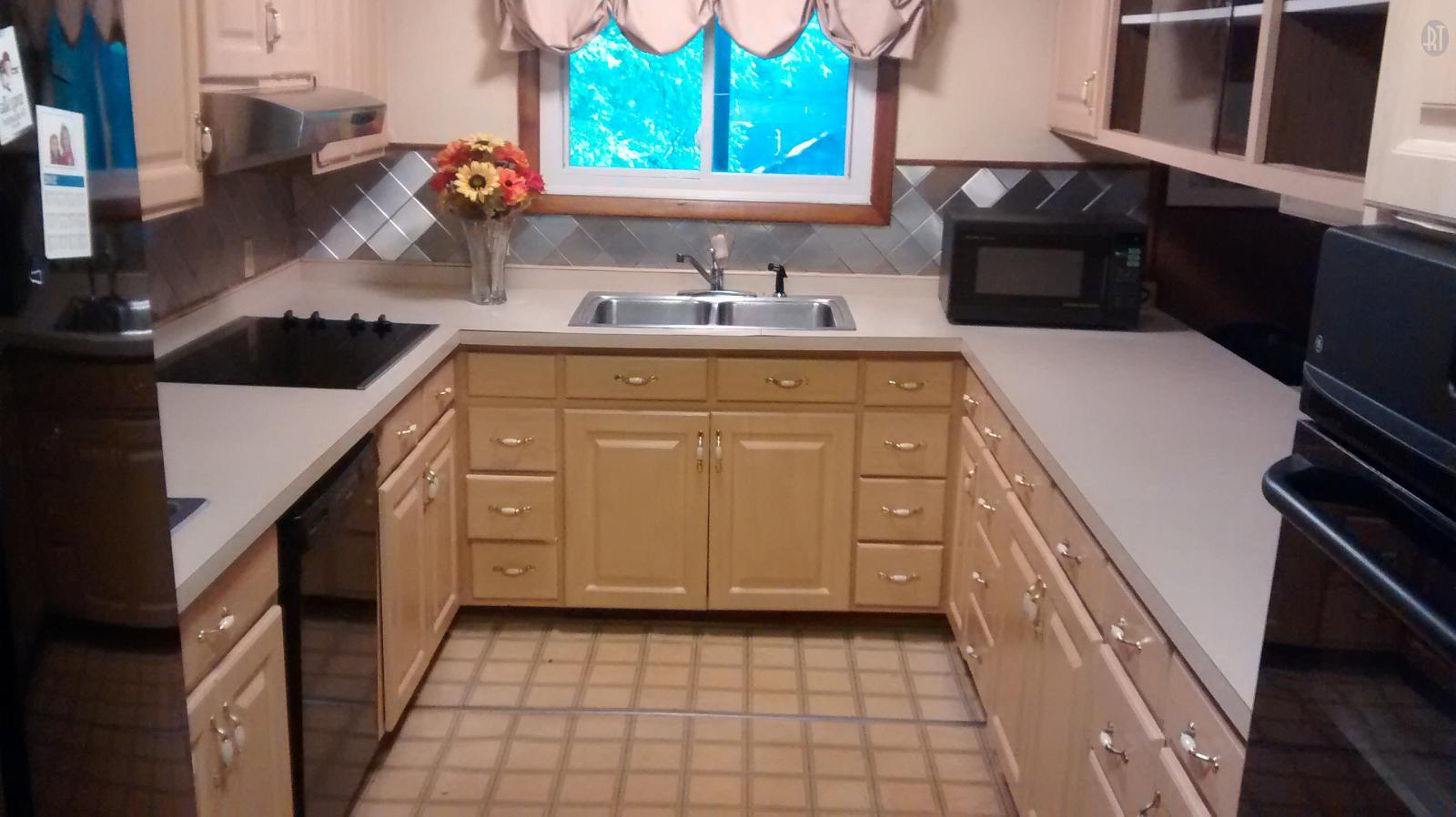 4141 West Hamilton Road Nashville, TN 37218 - Photo 15 of 30 Kitchen Equipped with Cook Top, Built-in Oven, Refrigerator and Microwave