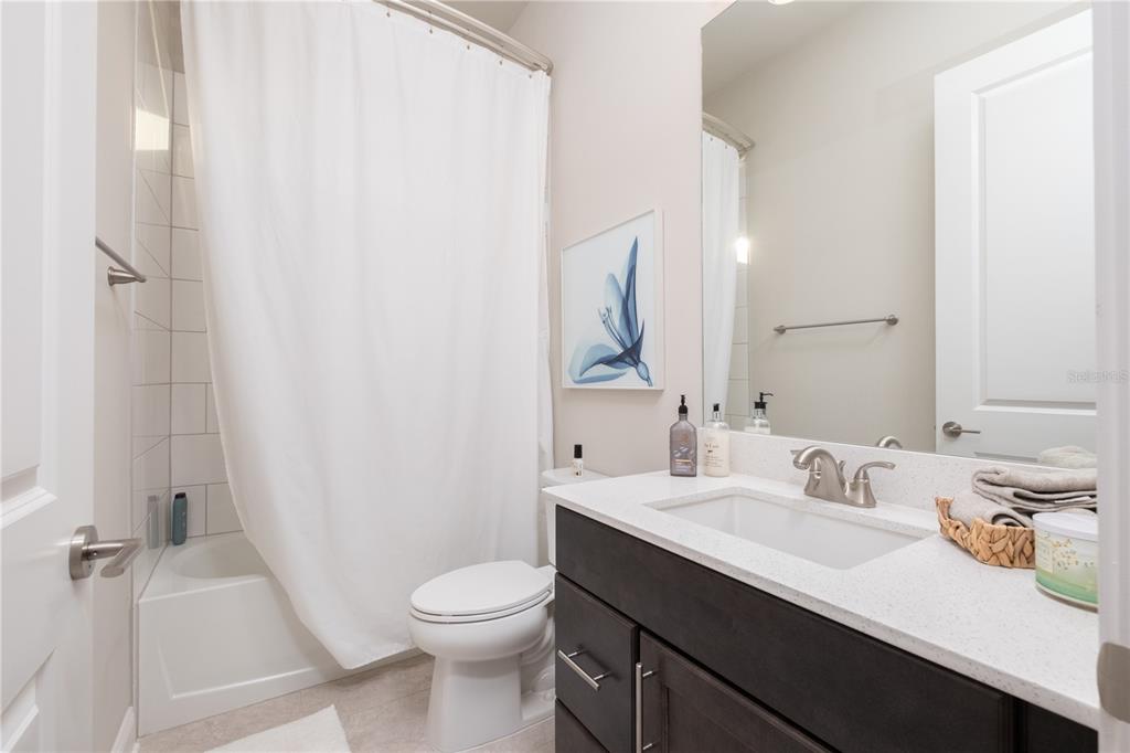 3350 Southwest 120th Terrace Gainesville, FL 32608 - Photo 21 of 32 a bathroom with a sink toilet and shower