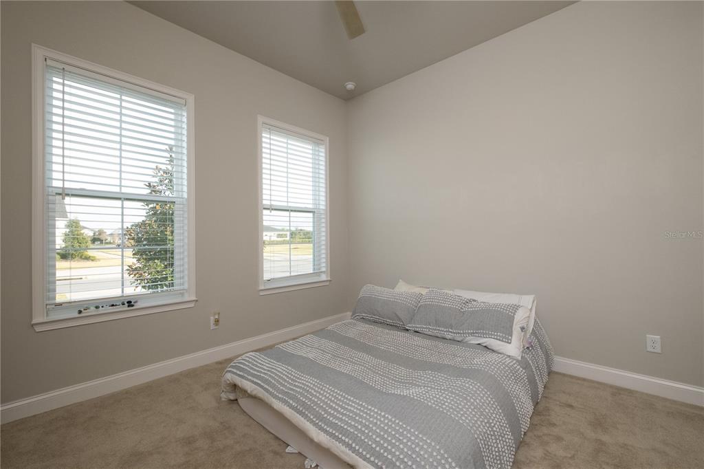 3350 Southwest 120th Terrace Gainesville, FL 32608 - Photo 23 of 32 a bedroom with a bed and a window