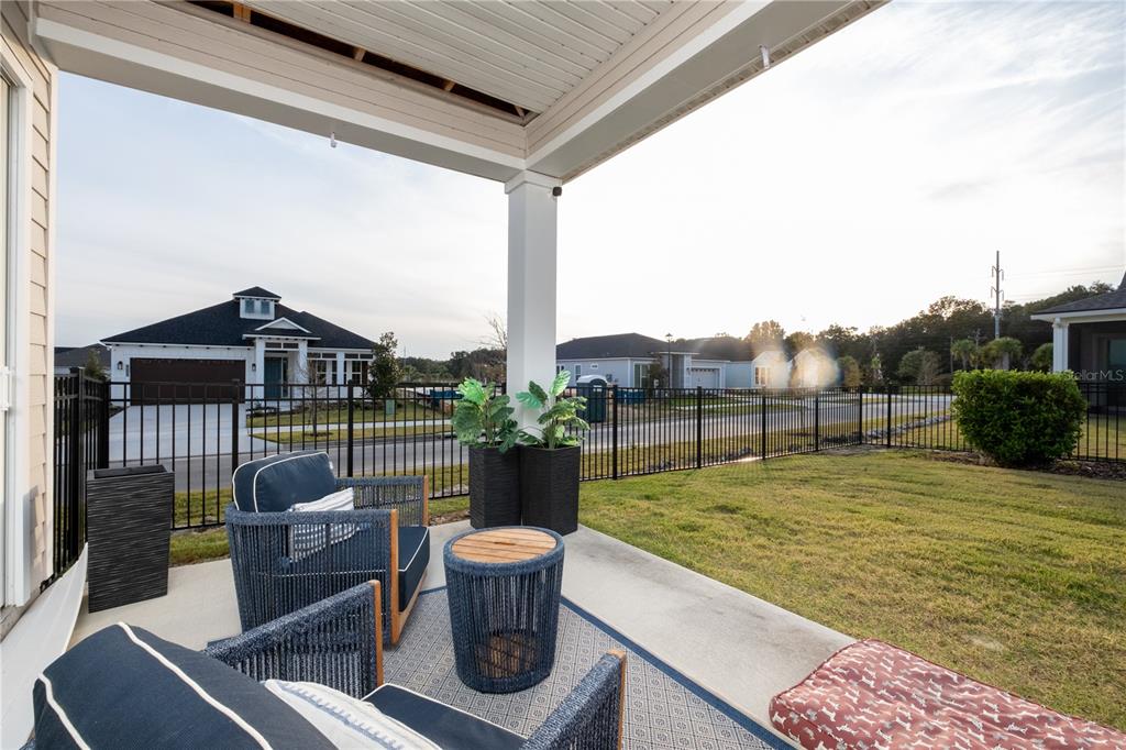 3350 Southwest 120th Terrace Gainesville, FL 32608 - Photo 29 of 32 a view of a porch with furniture