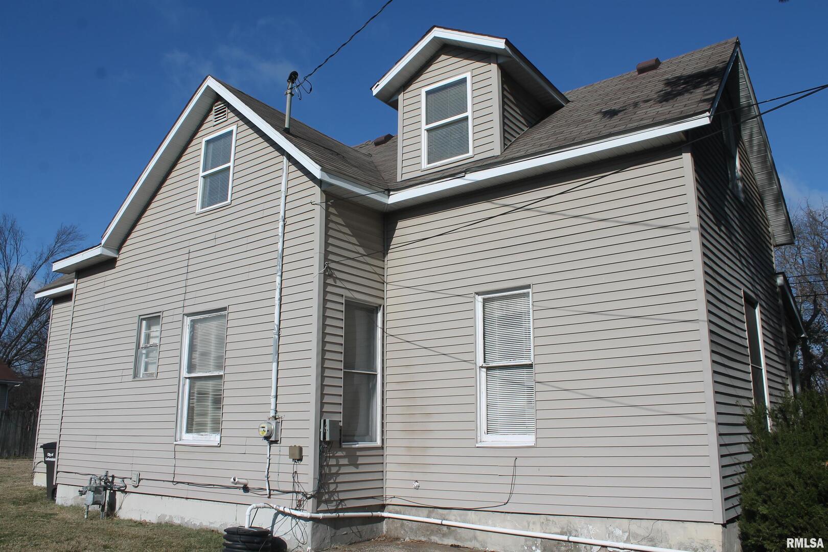 701 West Cherry Street, Unit 1 Carbondale, IL 62901 - Photo 2 of 9 a front view of a house with windows