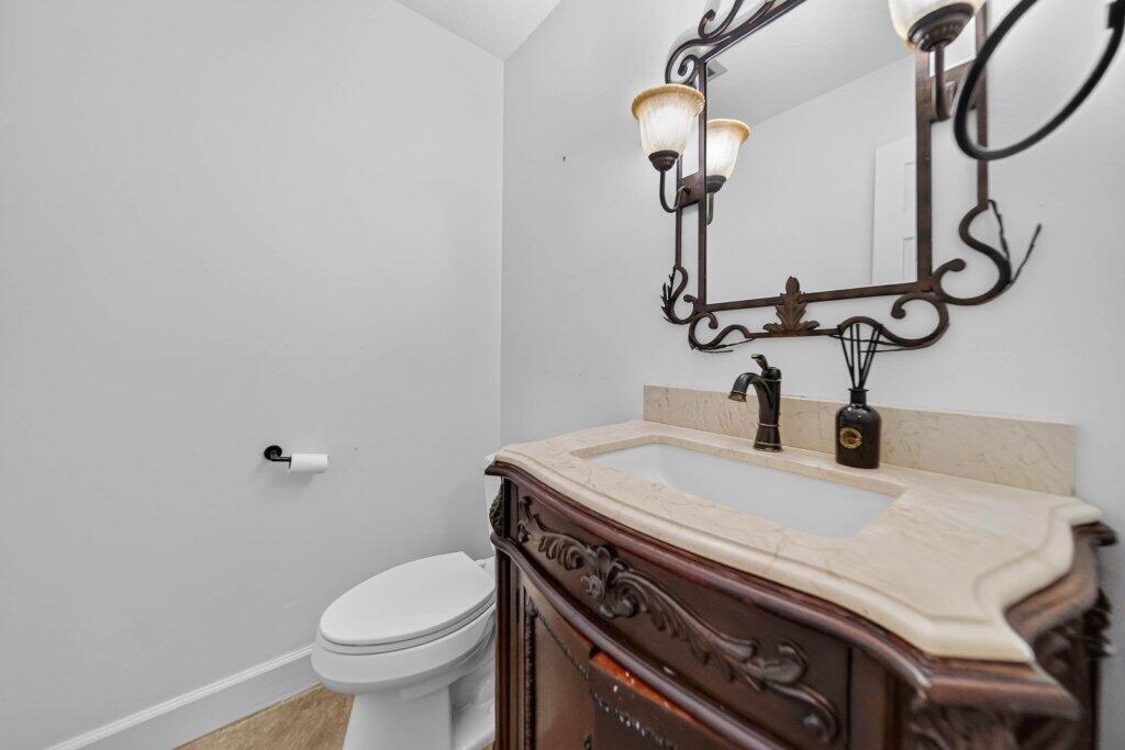 15 West High Point Road Sewall's Point, FL 34996 - Photo 42 of 61 halfbath1.jpg-SMALL