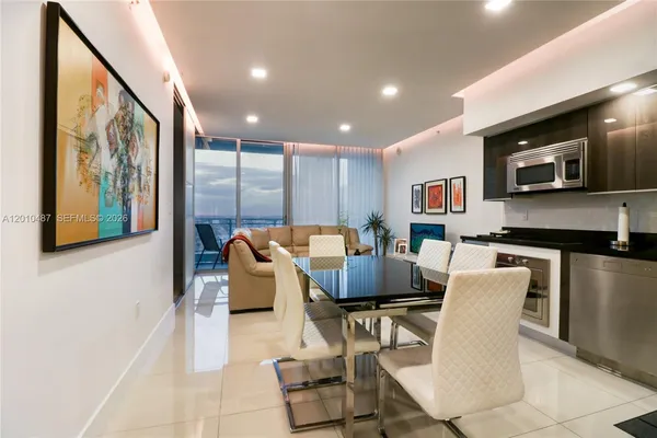 a view of a dining room with furniture