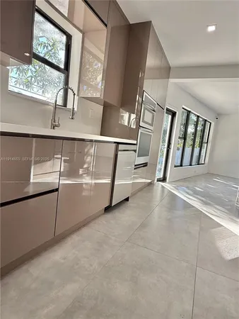 a view of a hallway with windows