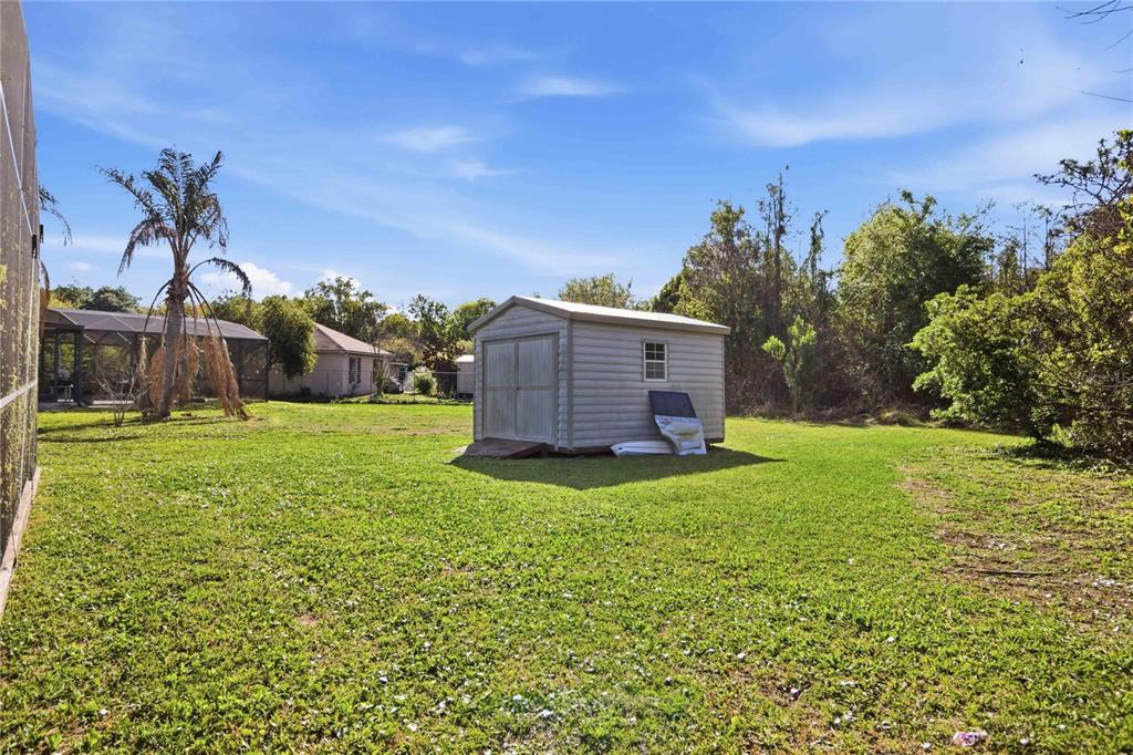 206 Taranto Way Kissimmee, FL 34758 - Photo 42 of 45 a view of a house with a backyard