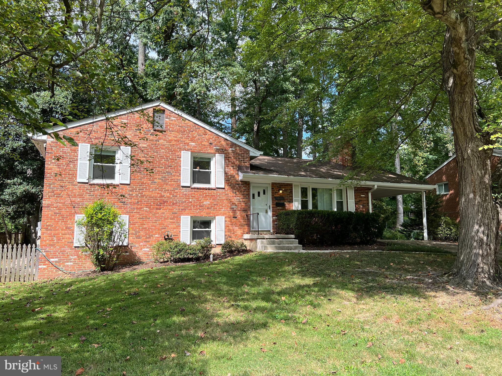 5626 Heming Avenue Springfield, VA 22151 - Photo 1 of 53 a front view of a house with a yard