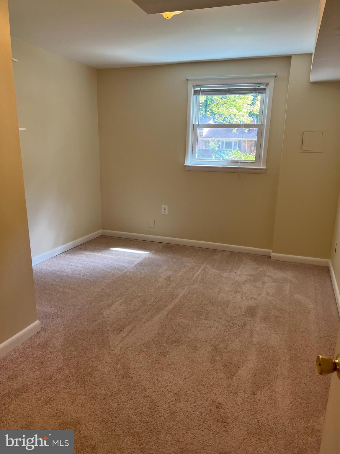 5626 Heming Avenue Springfield, VA 22151 - Photo 43 of 53 an empty room with windows
