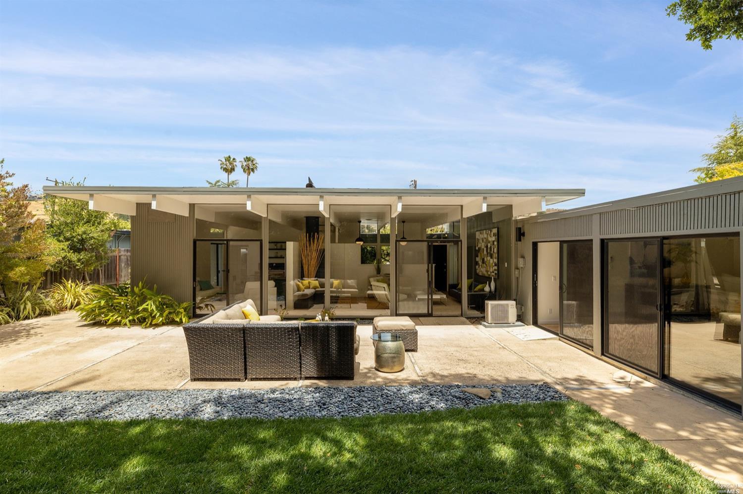 777 Montecillo Road San Rafael, CA 94903 - Photo 1 of 1 a view of a house with backyard porch and sitting area