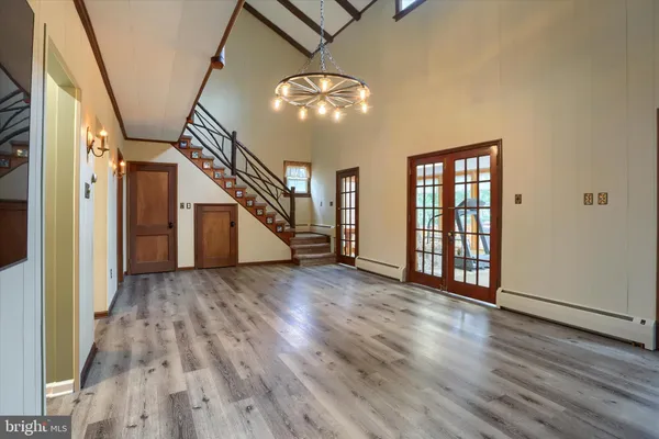 a kitchen with stainless steel appliances a sink stove and refrigerator