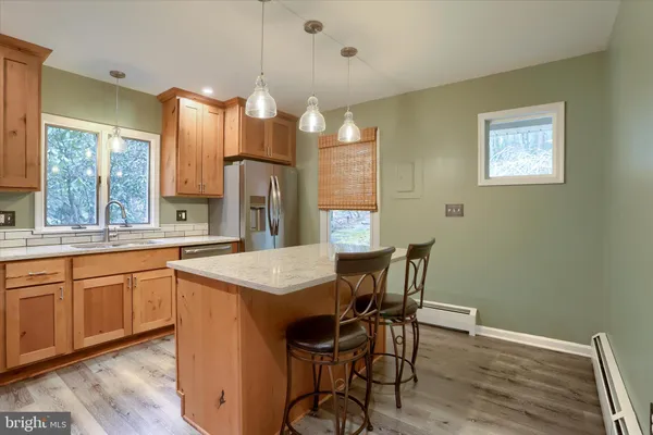 a kitchen with a stove and a microwave