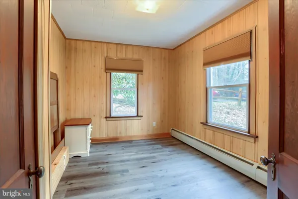 a bathroom with a shower and a toilet