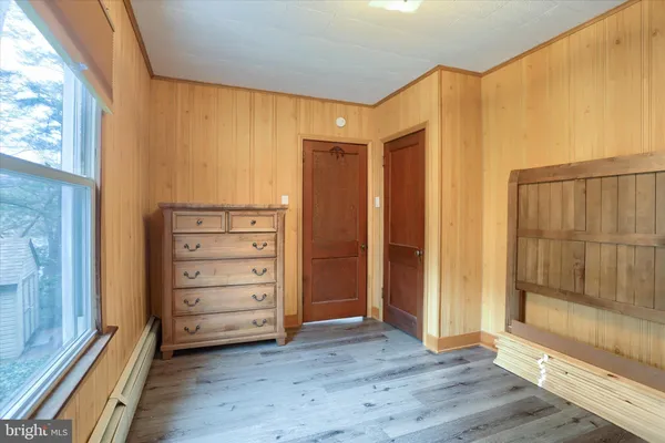 a bathroom with a sink toilet and mirror