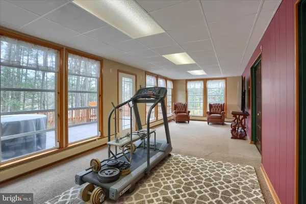 a bedroom with a bed and dresser