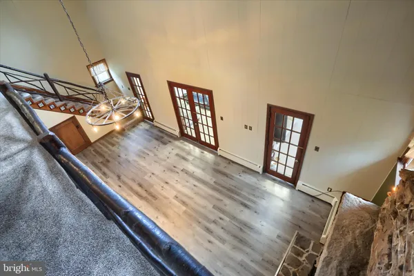 a front view of a house with parking area