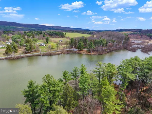 a view of a backyard of a house