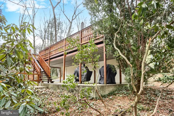 a view of a yard with swimming pool