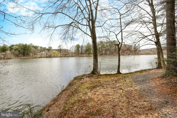 a view of house with outdoor space and street view