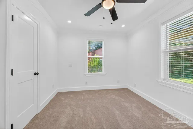 a bathroom with a double vanity sink a mirror and a shower