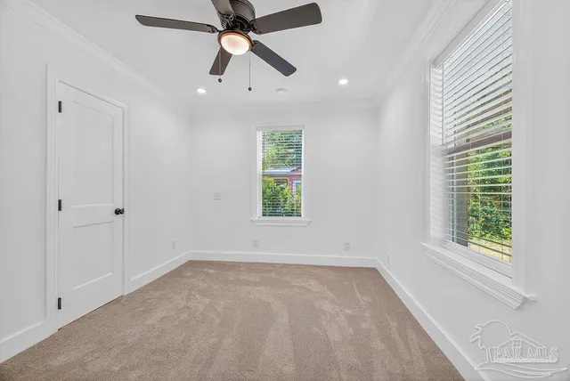 a bathroom with a double vanity sink mirror and shower