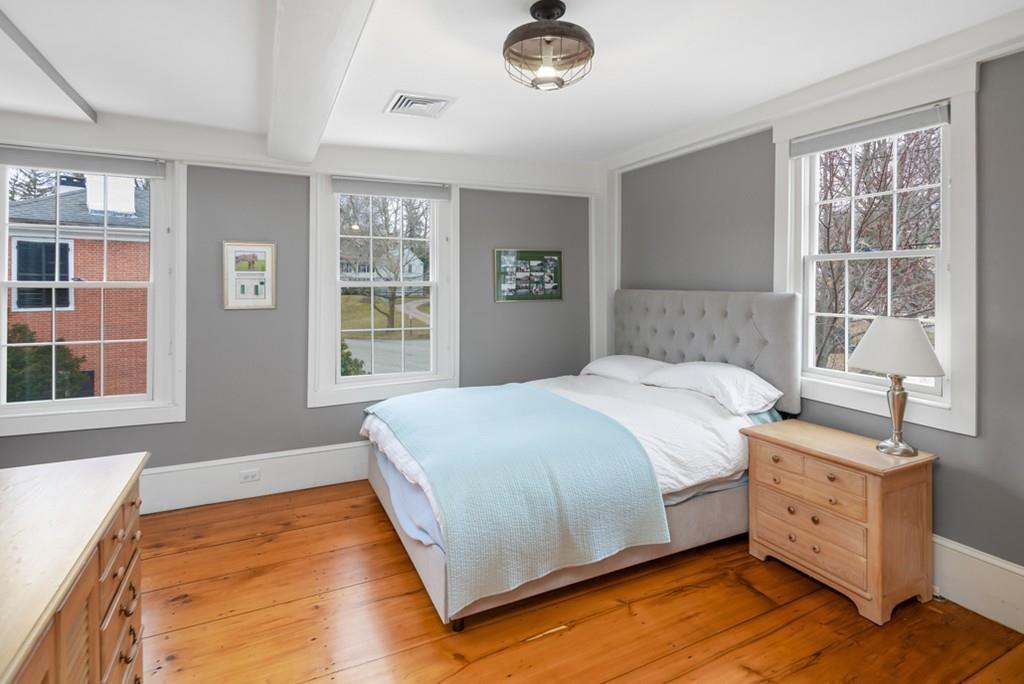 170 North Street Hingham, MA 02043 - Photo 25 of 42 a bedroom with a bed and a window