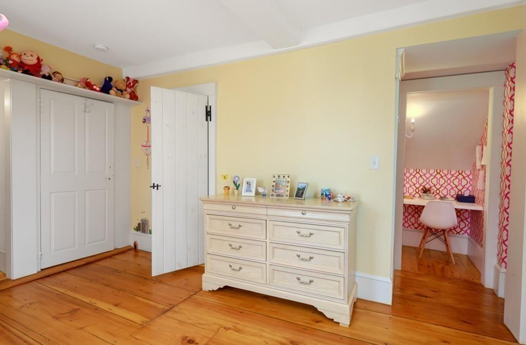 170 North Street Hingham, MA 02043 - Photo 28 of 42 a room with a dresser and a mirror