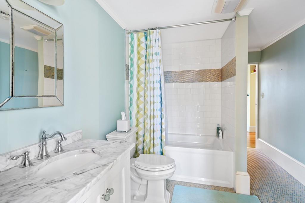 170 North Street Hingham, MA 02043 - Photo 29 of 42 a bathroom with a granite countertop sink toilet and shower