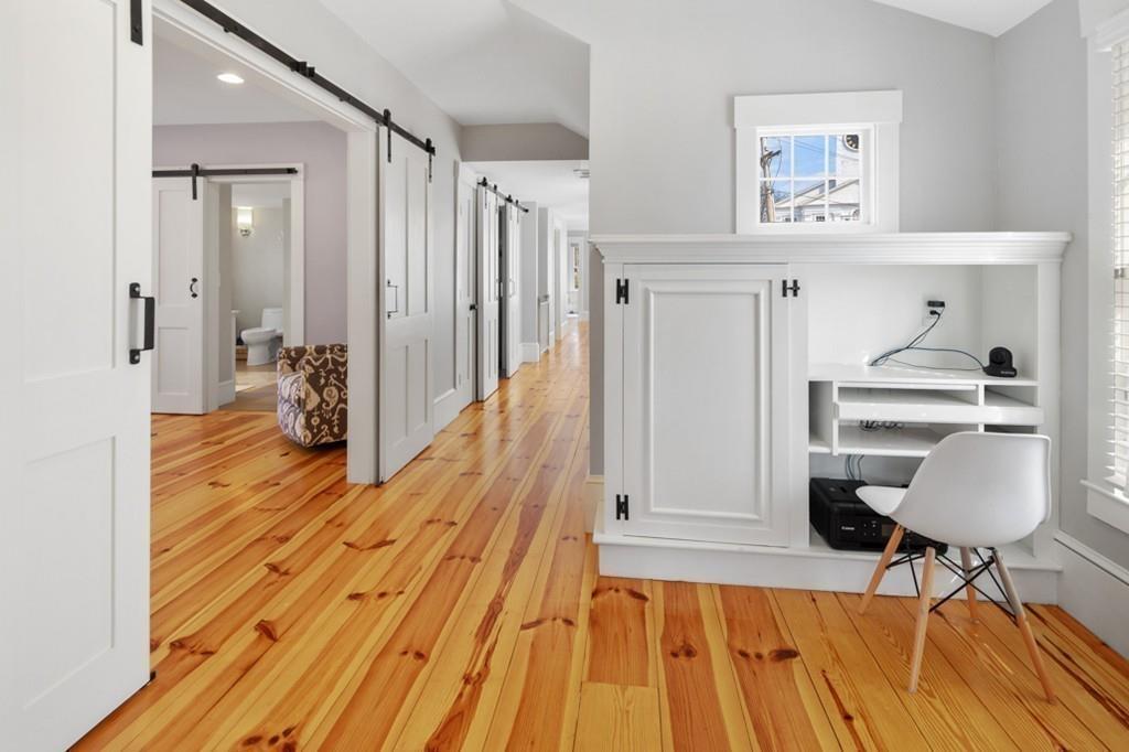 170 North Street Hingham, MA 02043 - Photo 30 of 42 a view of a bedroom with wooden floor and furniture