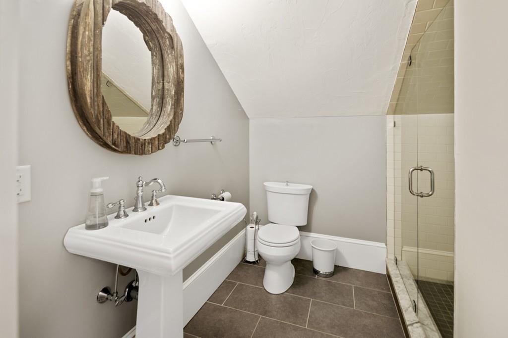 170 North Street Hingham, MA 02043 - Photo 33 of 42 a bathroom with a sink and a mirror