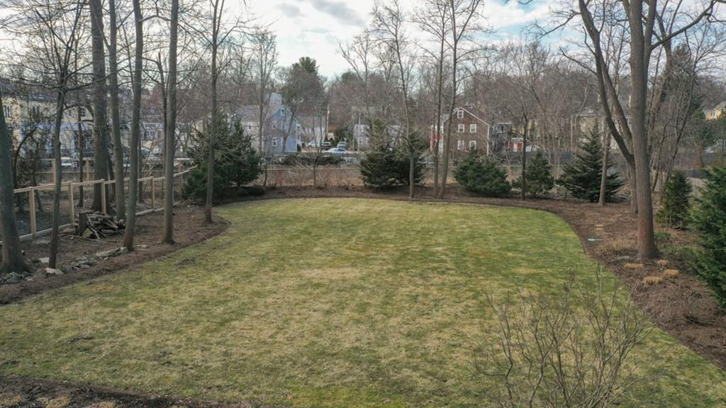 170 North Street Hingham, MA 02043 - Photo 35 of 42 a view of a yard with trees in front of it
