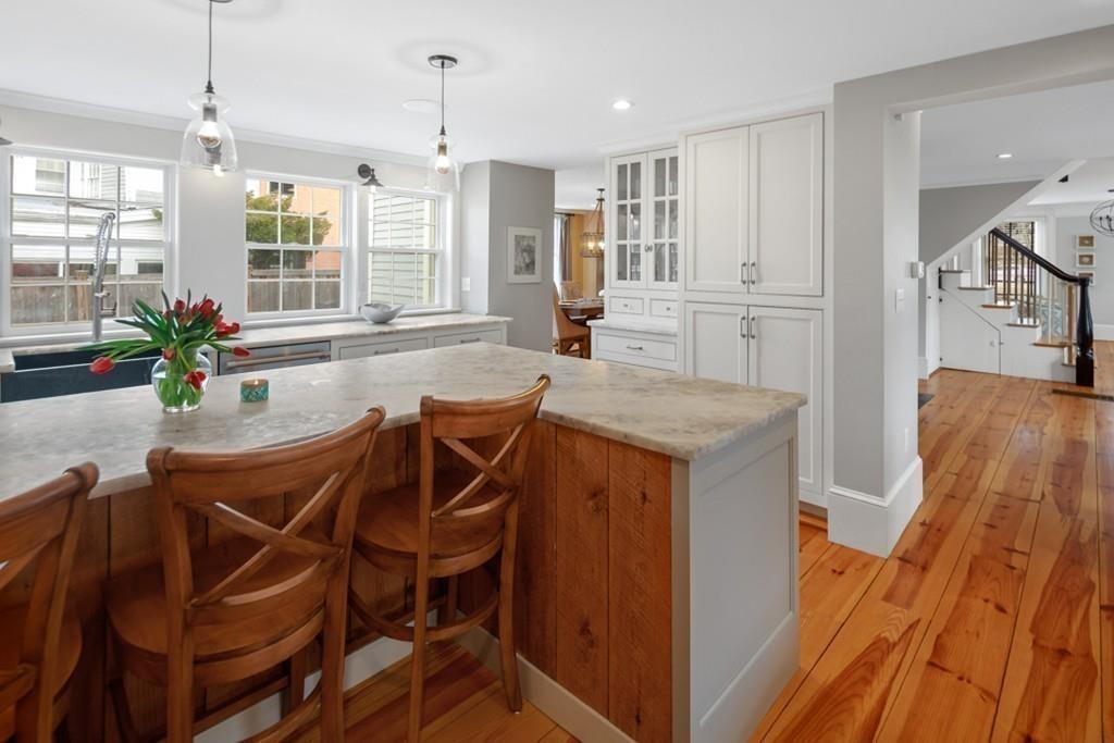 170 North Street Hingham, MA 02043 - Photo 4 of 42 a kitchen that has a table and chairs in it