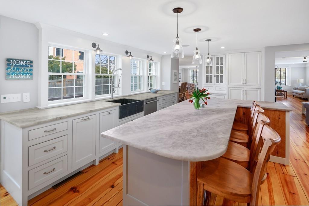 170 North Street Hingham, MA 02043 - Photo 6 of 42 a view of a kitchen and dining table cabinets