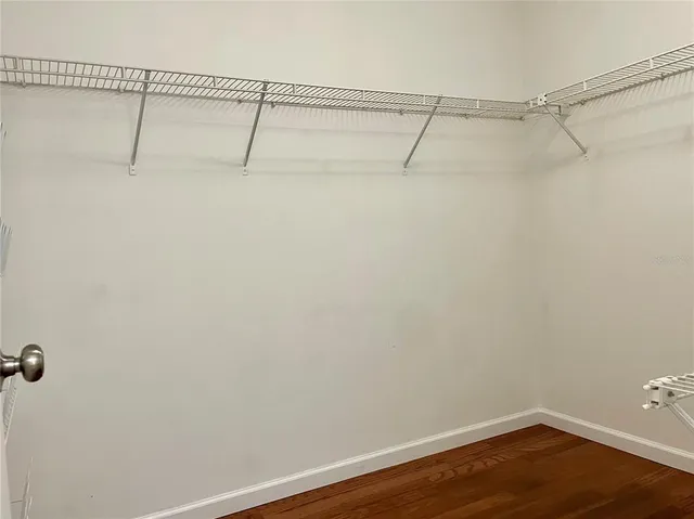 a view of a room with racks on the wall